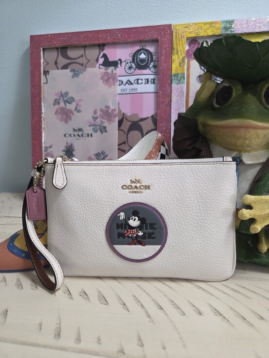 Coach Handbags - Coach x Disney Minnie Mouse Patch Small Wristlet in the "Chalk" white, EUC